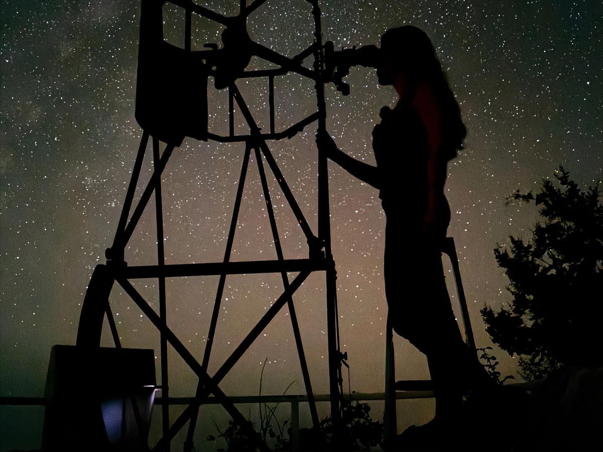 Luca observing under a starry Alpine sky