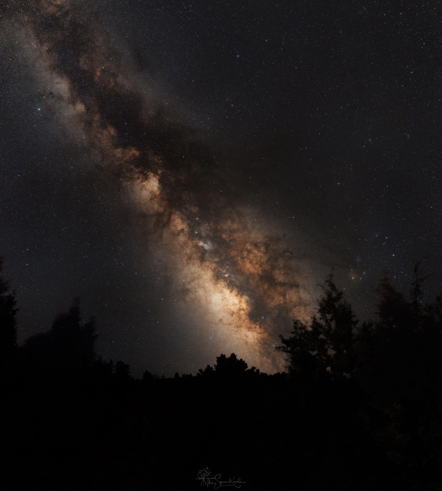 Milky Way over a dark mountain sky